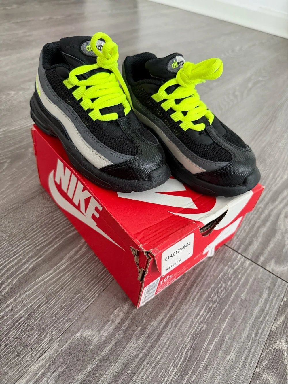 Nike Kids Black Sneakers with Neon Yellow Laces
